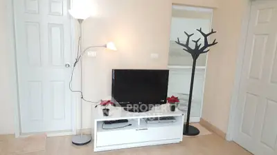 Modern living room with sleek TV stand and stylish decor