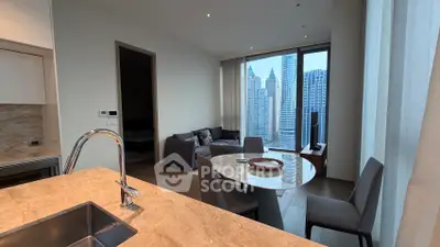 Luxurious modern living room with stunning city view, elegant furniture, and open kitchen layout.