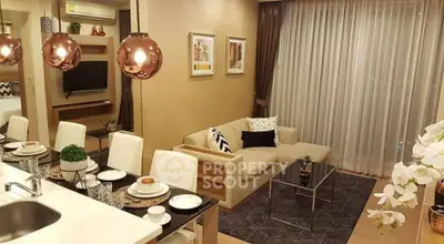 Elegant living room with modern decor, cozy sofa, and stylish dining area in open layout apartment.