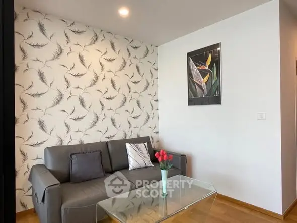 Modern living room with stylish wallpaper and cozy sofa