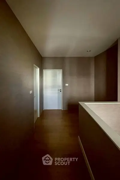 Spacious hallway with modern design and sleek wooden flooring