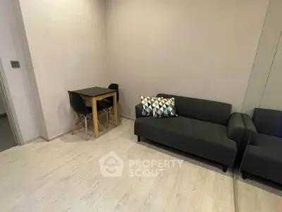 Modern living room with sleek furniture and minimalist design