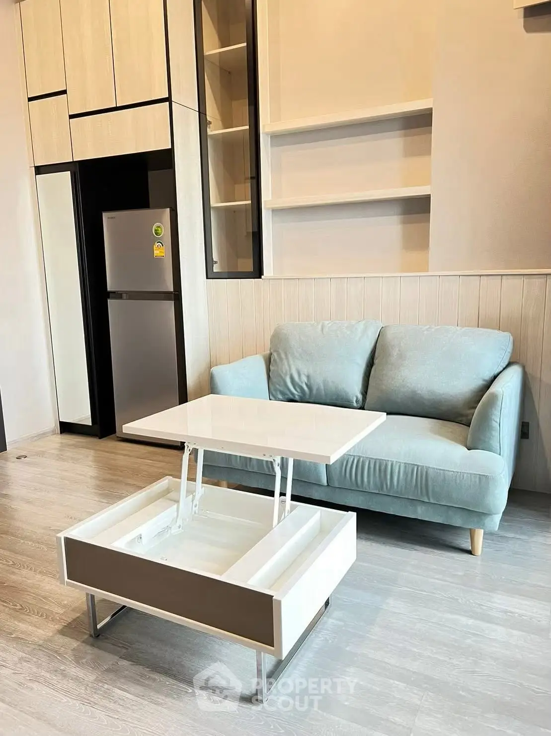 Modern living room with stylish sofa and multifunctional coffee table