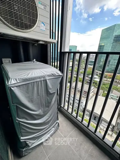 Modern balcony with city view and air conditioning unit, perfect for urban living.