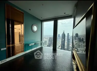 Luxurious high-rise apartment with stunning city view and modern interior design.
