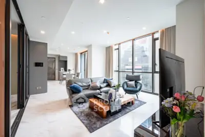 Luxurious modern living room with floor-to-ceiling windows and city view