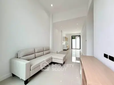 Spacious modern living room with sleek design and natural light