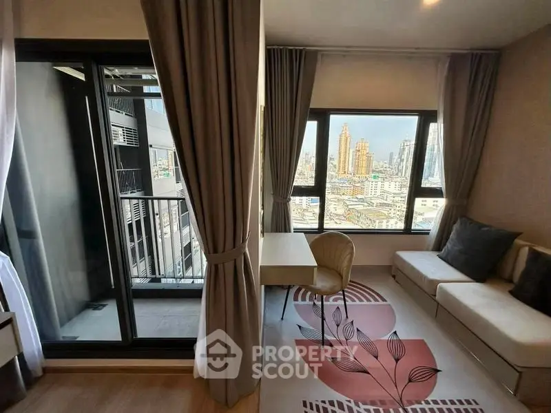 Modern living room with city view and balcony access in high-rise apartment