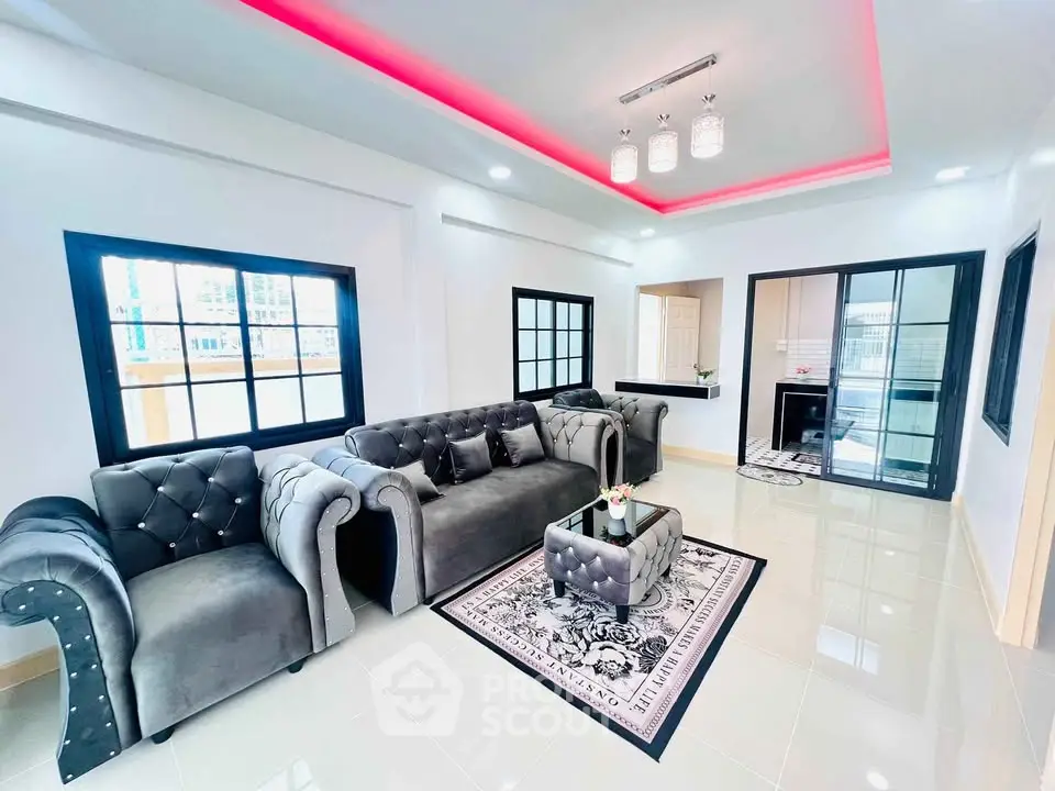 Elegant modern living room with plush sofas and chic lighting
