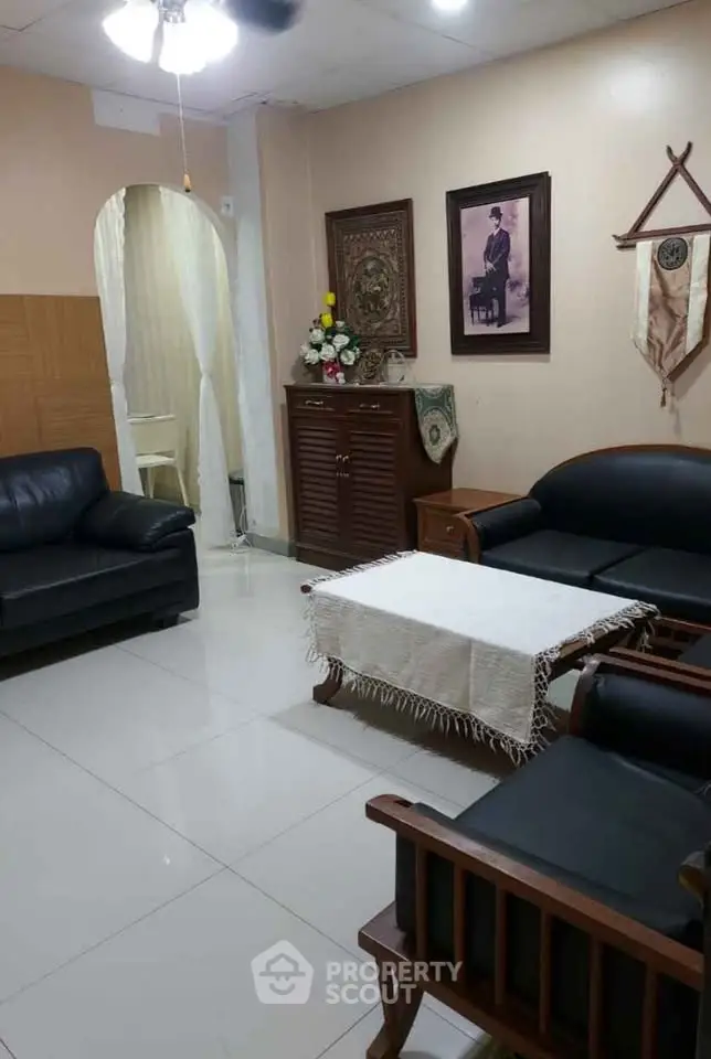 Cozy living room with elegant furniture and decor, perfect for relaxation and gatherings.