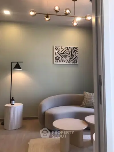 Modern living room with stylish furniture and elegant lighting