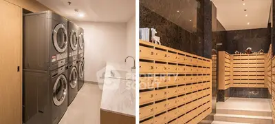Modern laundry room with stacked washers and dryers, and a stylish mailroom with wooden mailboxes.