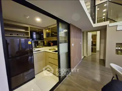 Modern kitchen with sleek design and open layout in stylish apartment