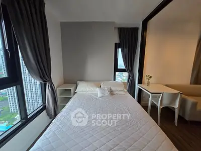 Modern bedroom with city view and elegant decor