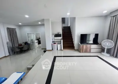 Spacious modern living room with sleek design and open layout