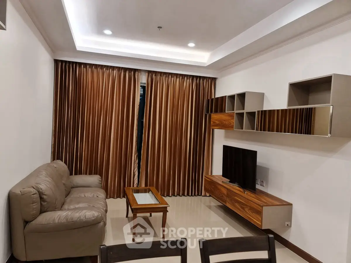 Modern living room with sleek furniture and elegant lighting