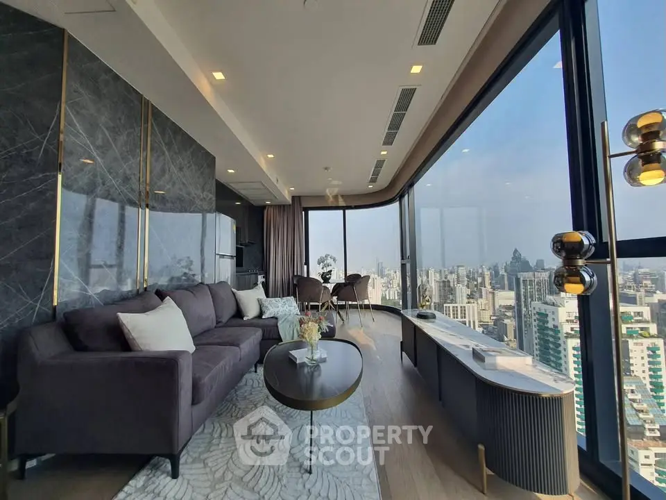 Luxurious corner unit living room with panoramic city views and modern decor