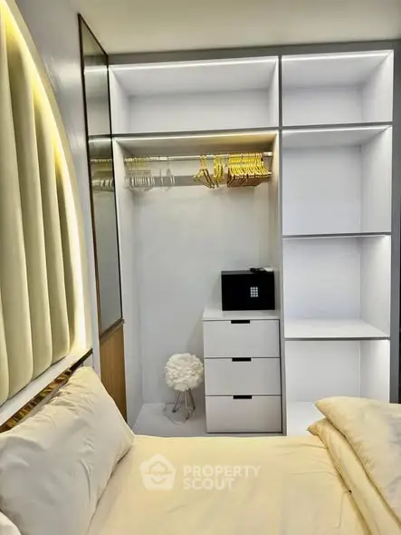 Modern bedroom with built-in closet and stylish decor