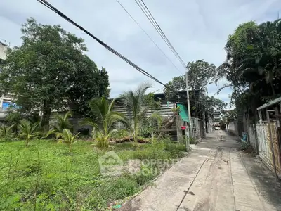 Spacious urban plot with lush greenery and potential for development