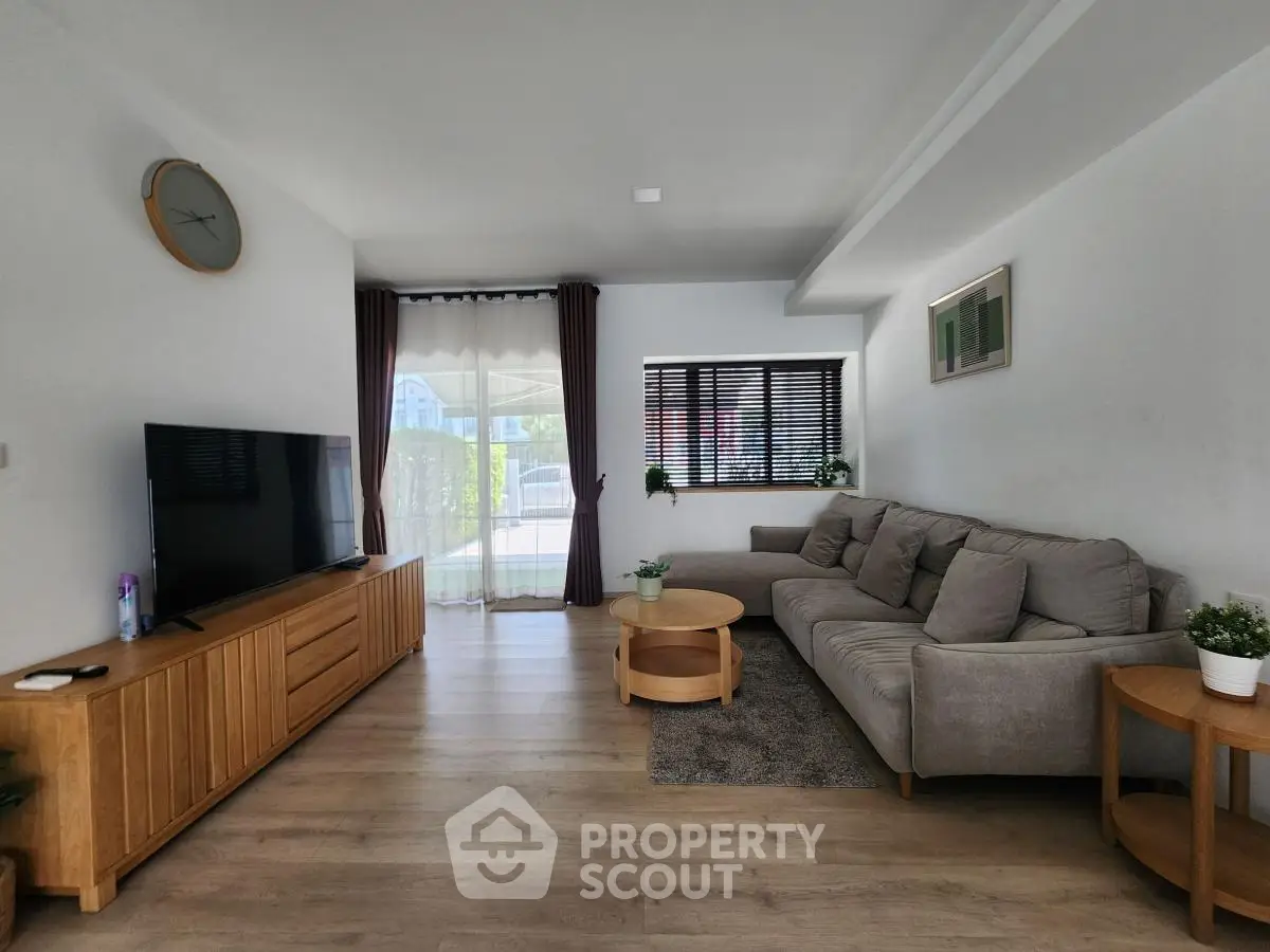 Spacious modern living room with stylish furniture and natural light