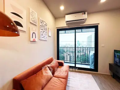 Modern living room with stylish decor and balcony view in urban apartment