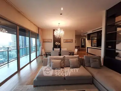 Luxurious living room with spacious balcony and stunning city view in modern apartment.
