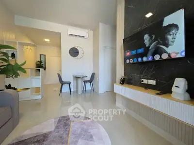 Modern living room with sleek TV setup and stylish decor