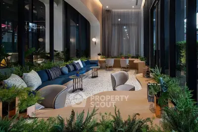 Luxurious modern living room with elegant decor and lush greenery, perfect for relaxation and entertaining.