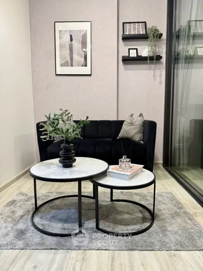 Stylish modern living room with elegant decor and cozy seating area.