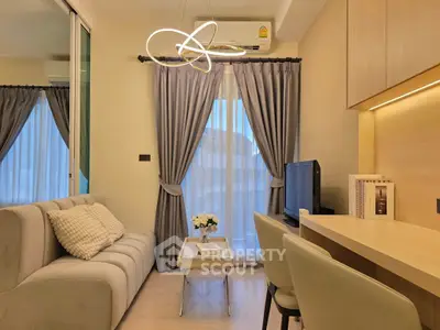 Modern living room with elegant decor and cozy seating area