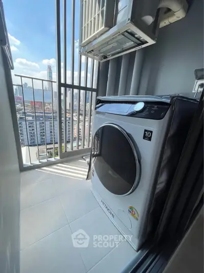 Modern balcony with city view and washing machine, perfect for urban living.