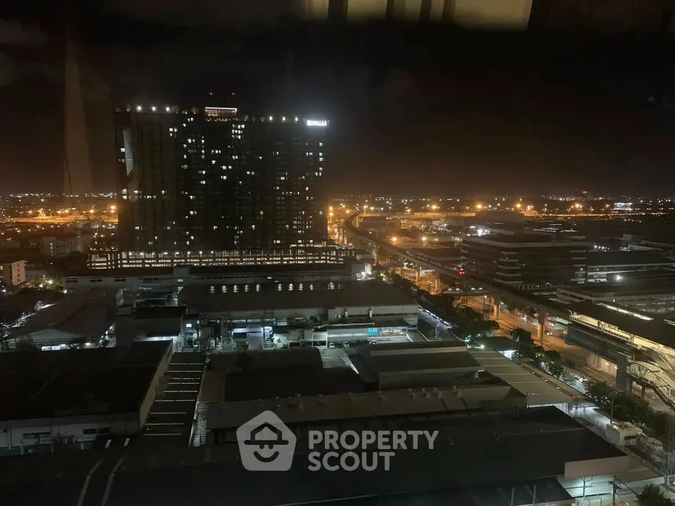 Stunning night view of cityscape with illuminated buildings and roads, perfect for urban living enthusiasts.