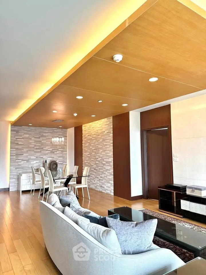 Spacious modern living room with elegant dining area and stylish decor