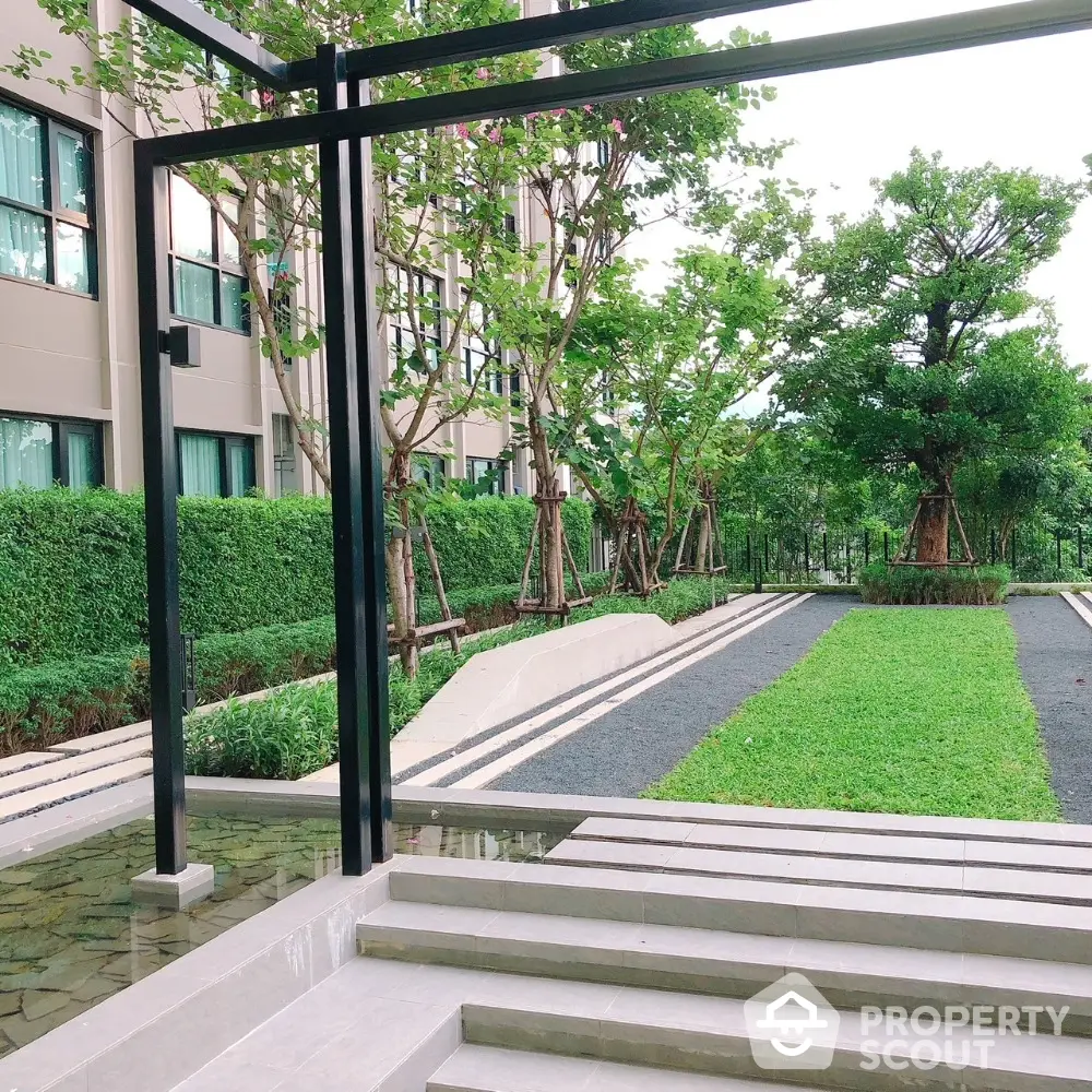 Luxurious garden view from modern apartment complex