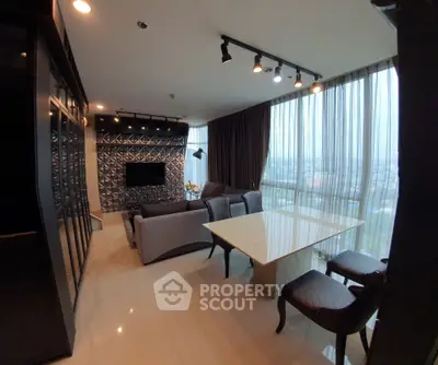 Luxurious modern living room with panoramic city view and elegant furnishings