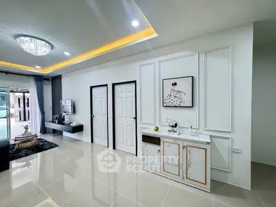 Elegant modern living room with glossy tiled floors and stylish decor