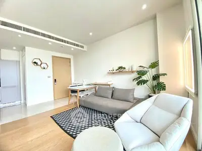 Bright and modern living room with stylish furniture and natural light