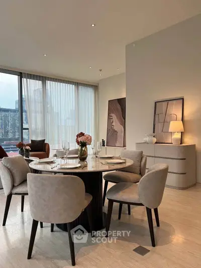 Elegant dining area with modern decor and city view, perfect for urban living.