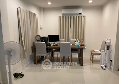 Modern study room with sleek furniture and air conditioning, perfect for productivity and comfort.
