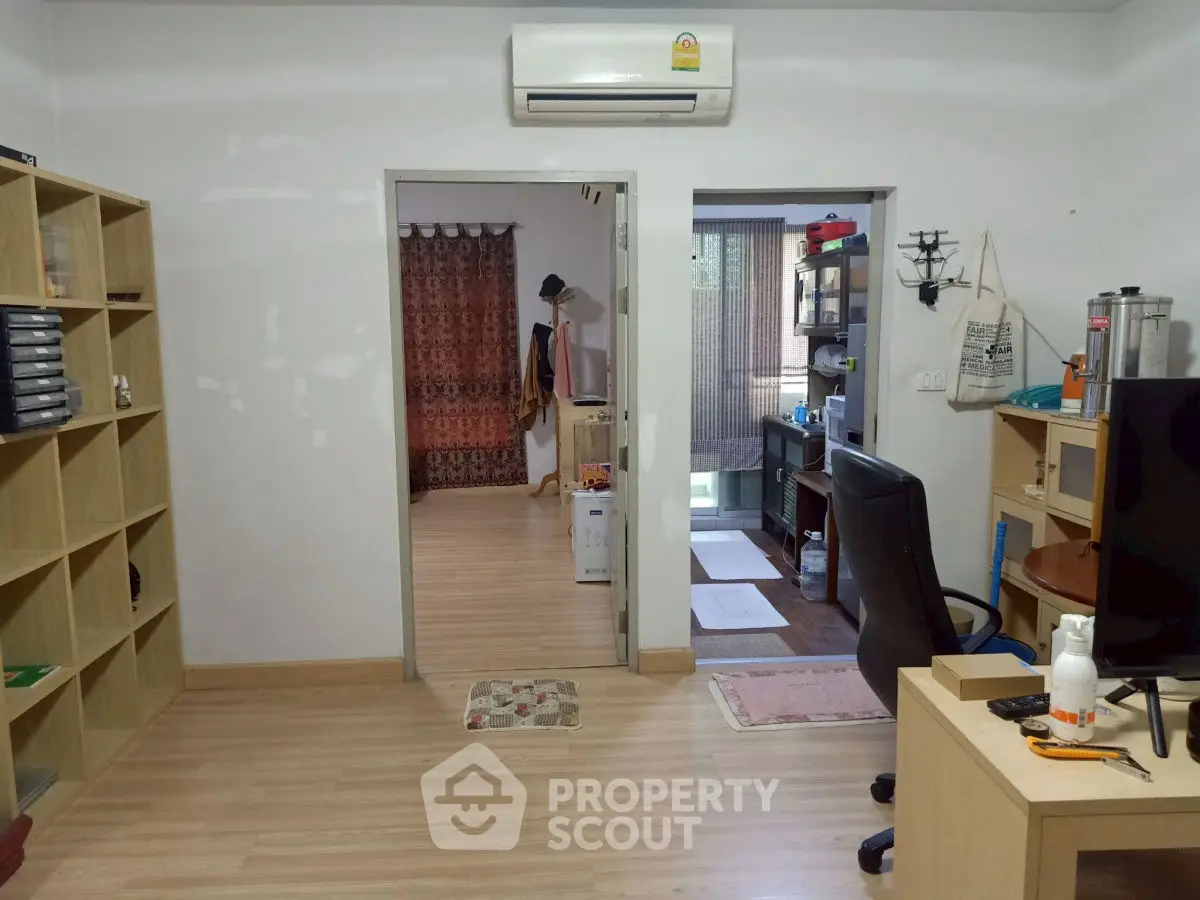 Spacious study room with modern decor and ample natural light