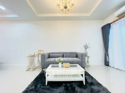 Elegant living room with chandelier and modern decor