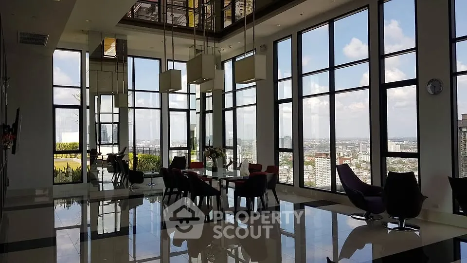 Luxurious high-rise building with stunning city view and elegant interior design.