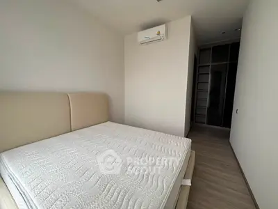 Modern bedroom with minimalist design and built-in wardrobe