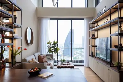 Luxurious living room with floor-to-ceiling windows and stunning city view, modern decor and ample natural light.