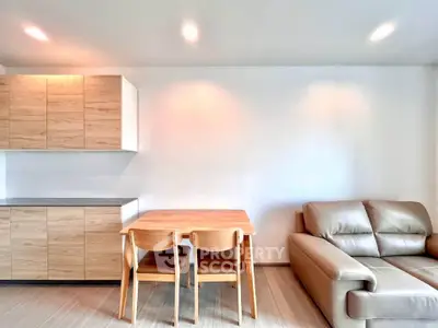 Modern living room with sleek furniture and wooden accents, perfect for contemporary living.