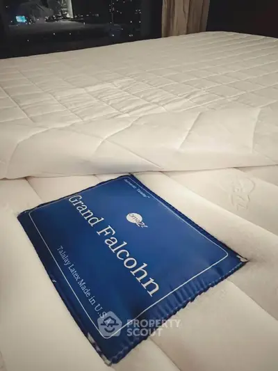 Luxurious bedroom with premium Grand Falcohn mattress, offering ultimate comfort and elegance for restful nights.