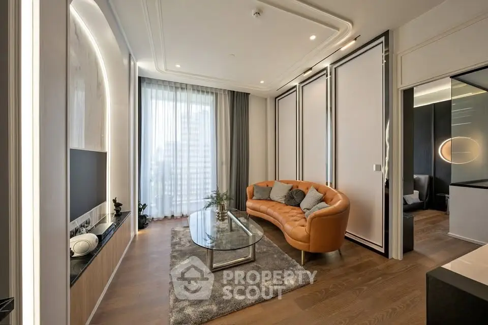 Luxurious modern living room with elegant decor and large windows