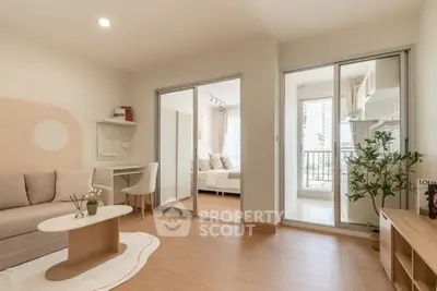 Modern apartment interior with cozy living room, bedroom, and kitchen
