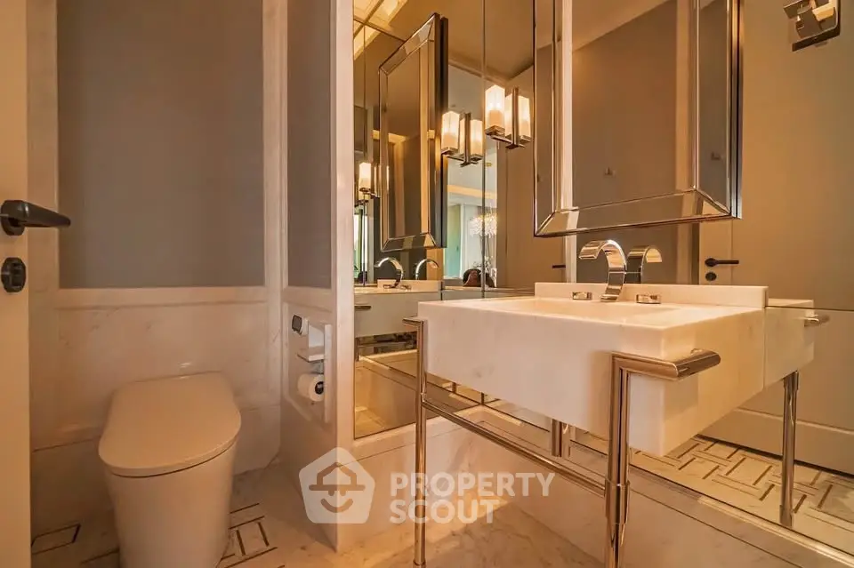 Luxurious modern bathroom with elegant fixtures and marble accents