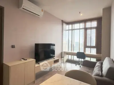 Modern living room with city view, featuring sleek furniture and large windows.